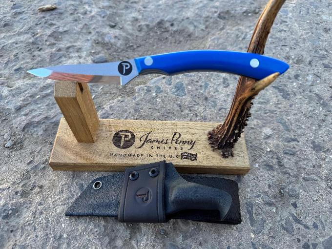 3 inch drop point hunting knife with blue handle