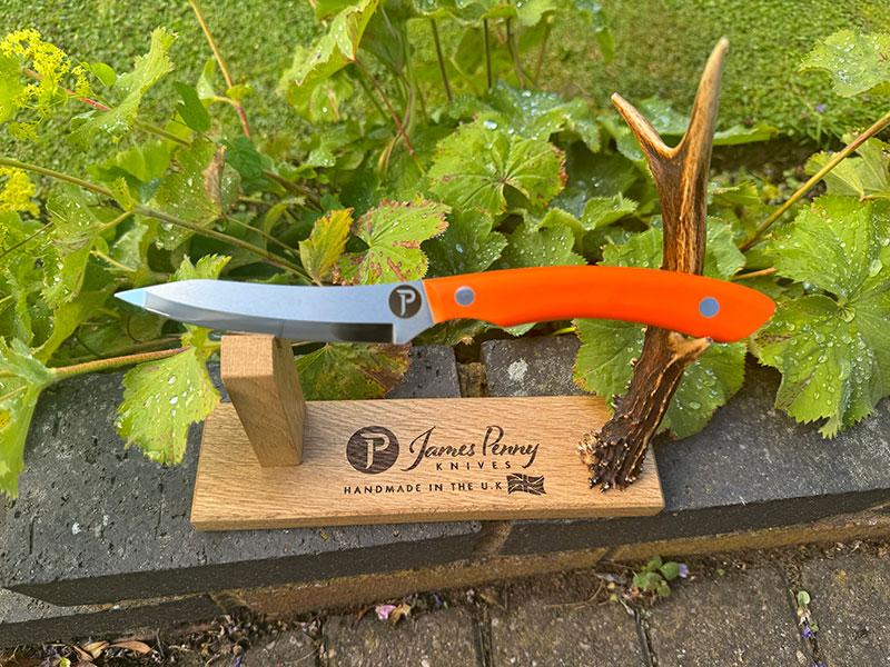 Orange drop point hunting knives