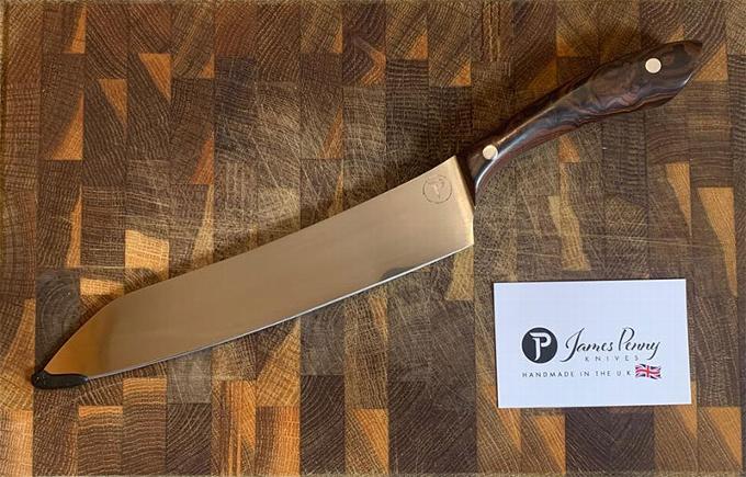 Kitchen Knife on chopping board