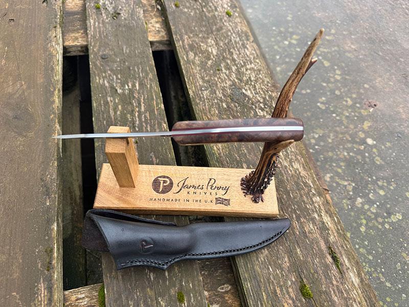 walnut handle knife from top 